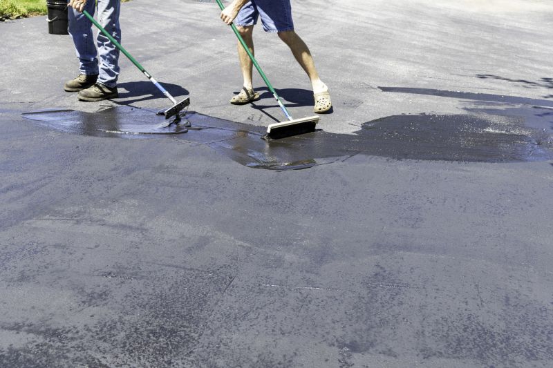 Local Hot Tar Driveway Sealing pros at work
